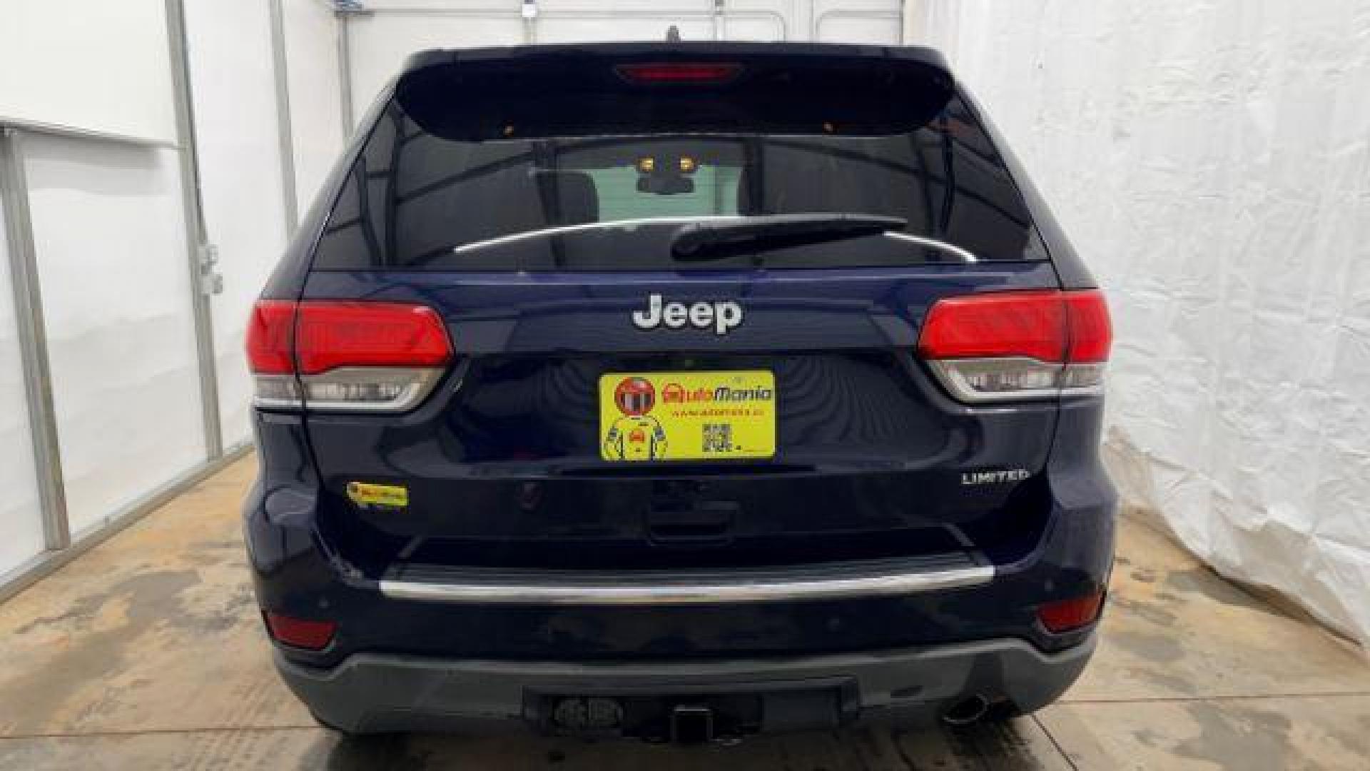2015 Blue Jeep Grand Cherokee Limited (1C4RJEBG4FC) with an 3.6L V-6 DOHC engine, located at 1806 Veterans Memorial Hwy SW, Austell, GA, 30168, (770) 944-9558, 33.817959, -84.606987 - Photo#4