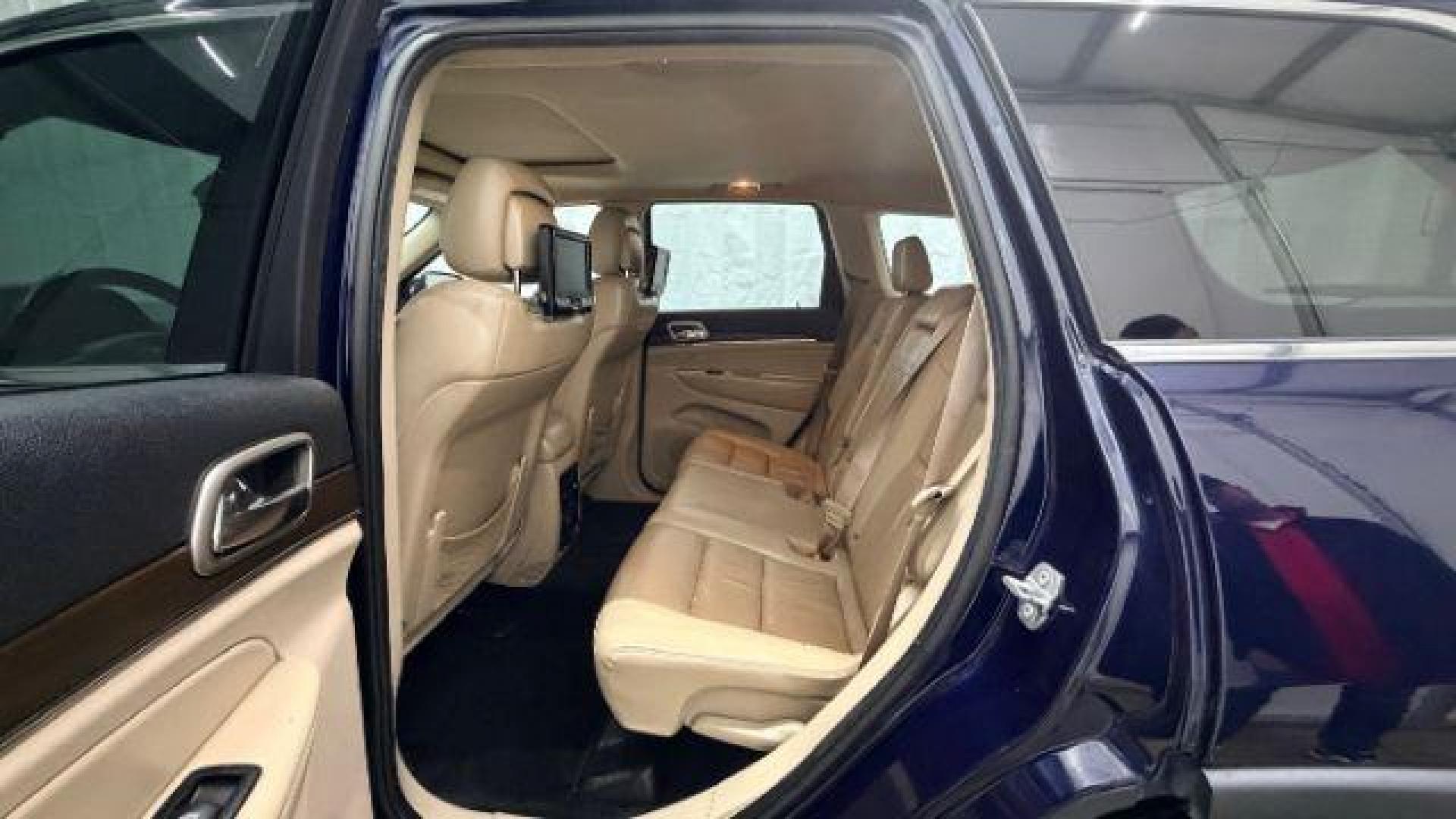 2015 Blue Jeep Grand Cherokee Limited (1C4RJEBG4FC) with an 3.6L V-6 DOHC engine, located at 1806 Veterans Memorial Hwy SW, Austell, GA, 30168, (770) 944-9558, 33.817959, -84.606987 - Photo#14