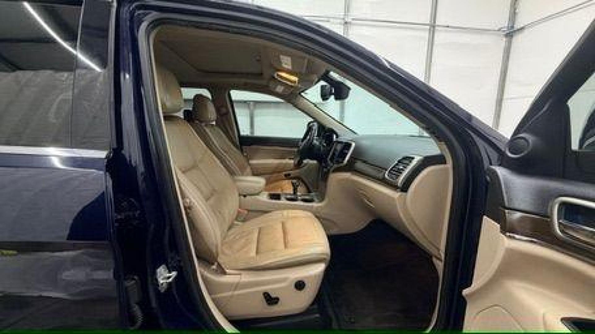 2015 Blue Jeep Grand Cherokee Limited (1C4RJEBG4FC) with an 3.6L V-6 DOHC engine, located at 1806 Veterans Memorial Hwy SW, Austell, GA, 30168, (770) 944-9558, 33.817959, -84.606987 - Photo#17