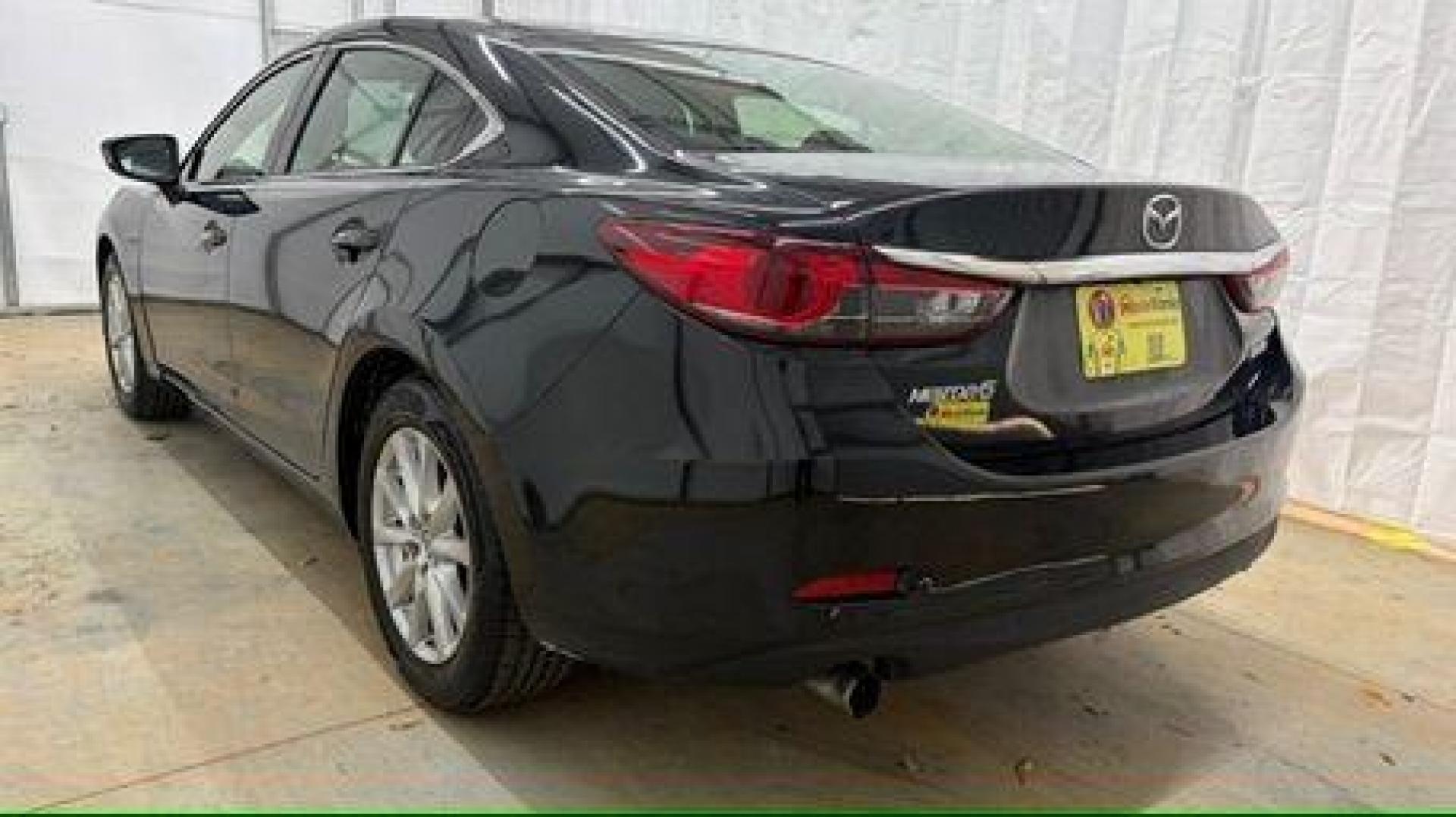 2016 Black Mazda Mazda6 i Sport (JM1GJ1U57G1) with an SKYACTIV-G 2.5L I-4 gasoline direct injection engine, located at 1806 Veterans Memorial Hwy SW, Austell, GA, 30168, (770) 944-9558, 33.817959, -84.606987 - Photo#3