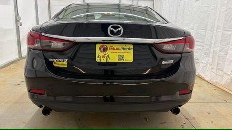 2016 Black Mazda Mazda6 i Sport (JM1GJ1U57G1) with an SKYACTIV-G 2.5L I-4 gasoline direct injection engine, located at 1806 Veterans Memorial Hwy SW, Austell, GA, 30168, (770) 944-9558, 33.817959, -84.606987 - Photo#4