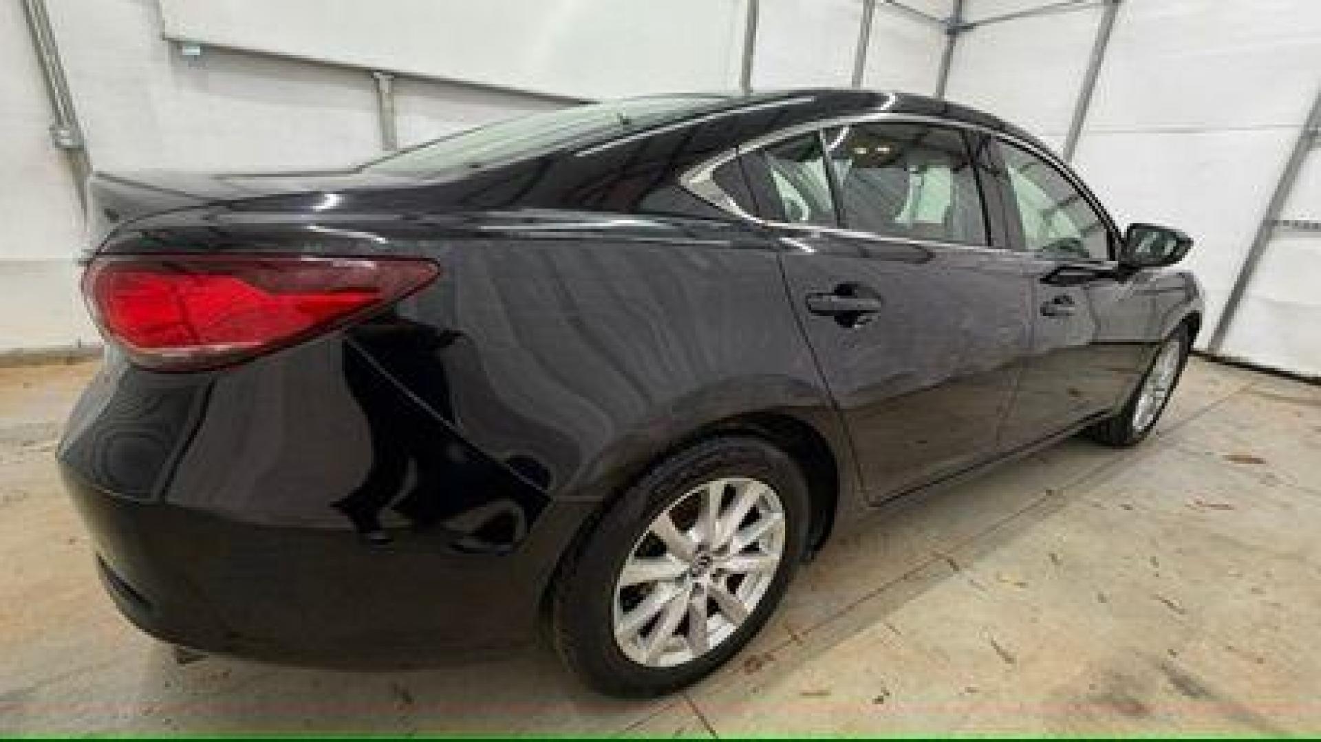 2016 Black Mazda Mazda6 i Sport (JM1GJ1U57G1) with an SKYACTIV-G 2.5L I-4 gasoline direct injection engine, located at 1806 Veterans Memorial Hwy SW, Austell, GA, 30168, (770) 944-9558, 33.817959, -84.606987 - Photo#6