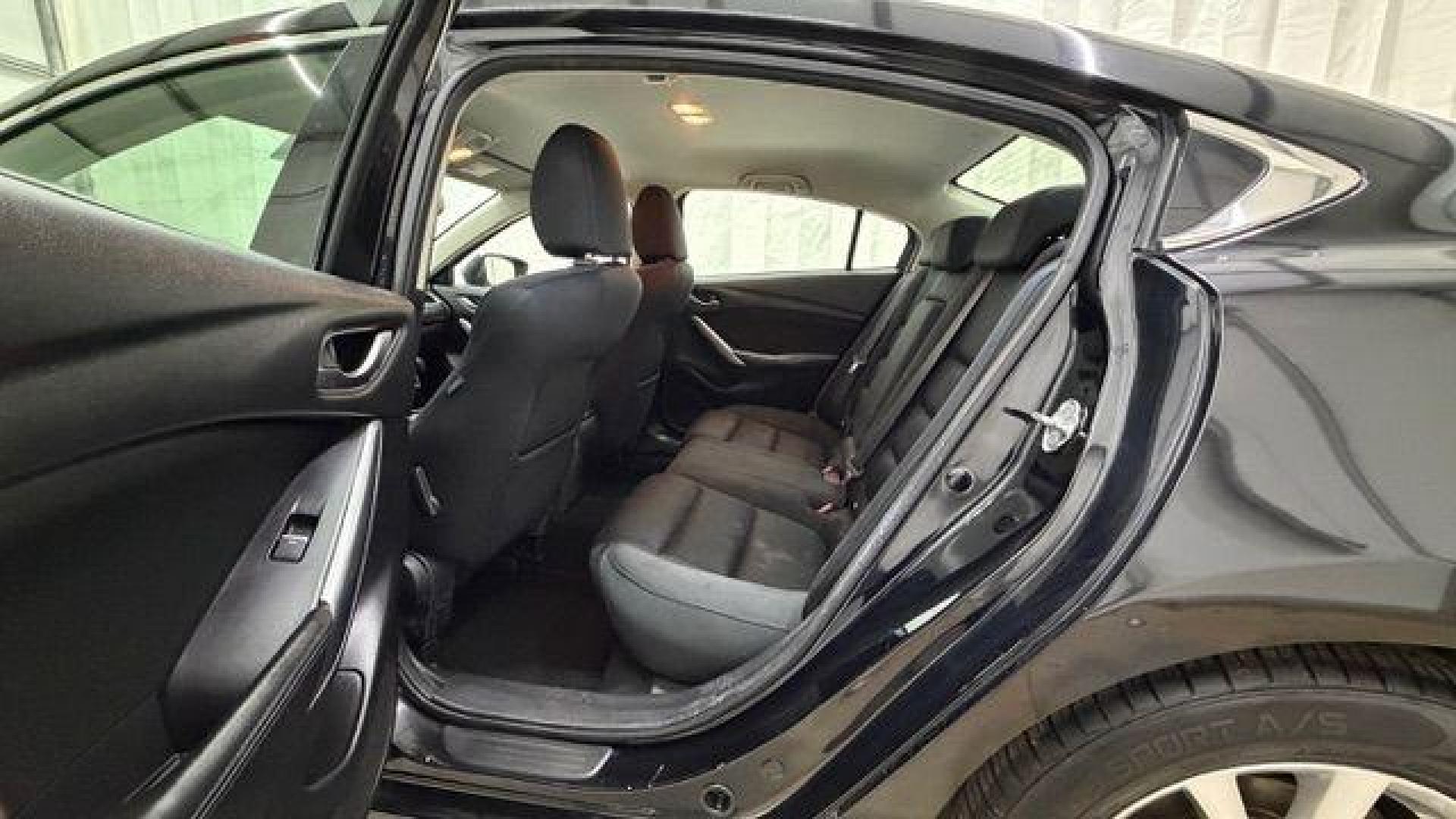 2016 Black Mazda Mazda6 i Sport (JM1GJ1U57G1) with an SKYACTIV-G 2.5L I-4 gasoline direct injection engine, located at 1806 Veterans Memorial Hwy SW, Austell, GA, 30168, (770) 944-9558, 33.817959, -84.606987 - Photo#14