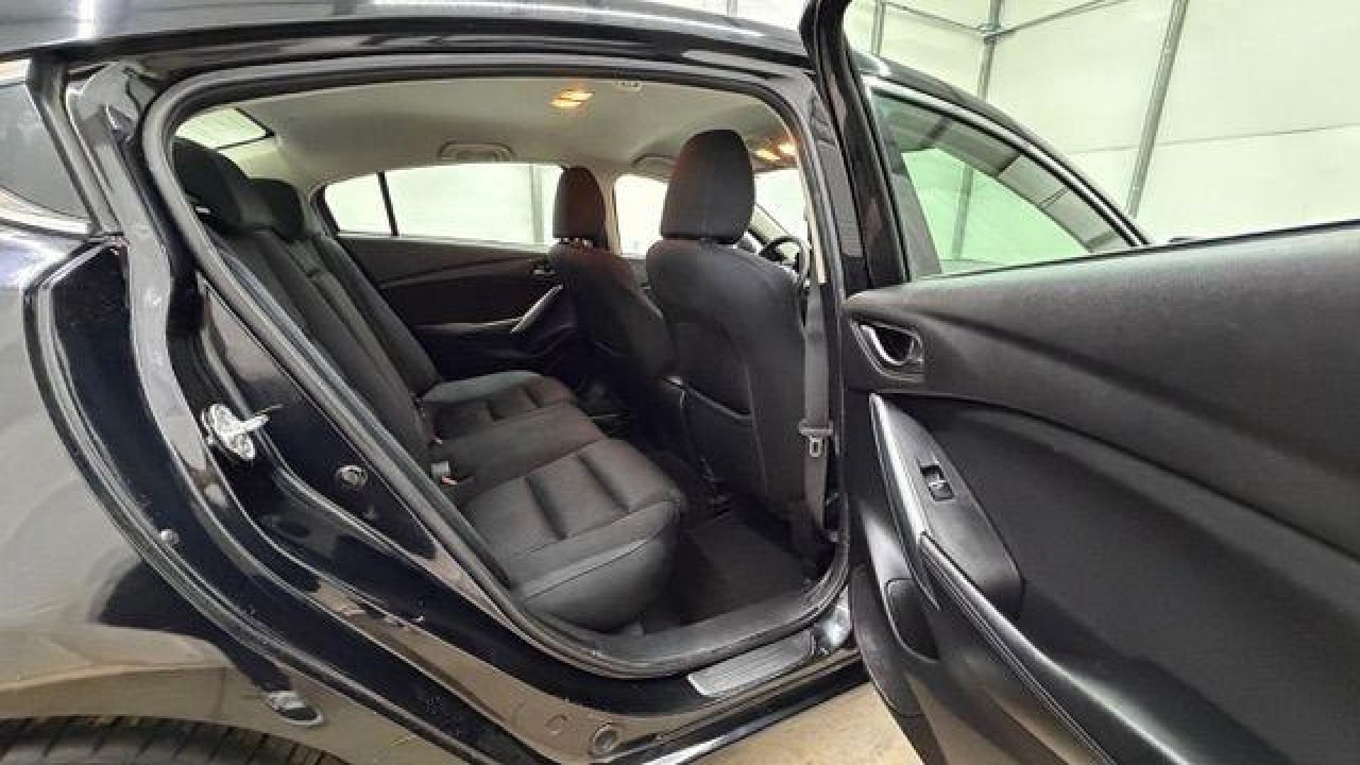 2016 Black Mazda Mazda6 i Sport (JM1GJ1U57G1) with an SKYACTIV-G 2.5L I-4 gasoline direct injection engine, located at 1806 Veterans Memorial Hwy SW, Austell, GA, 30168, (770) 944-9558, 33.817959, -84.606987 - Photo#16