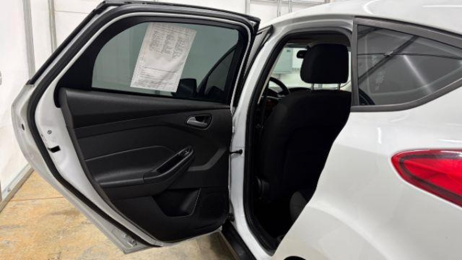 2017 White Ford Focus SE (1FADP3K26HL) with an 2L I-4 gasoline direct injection engine, located at 1806 Veterans Memorial Hwy SW, Austell, GA, 30168, (770) 944-9558, 33.817959, -84.606987 - Photo#13