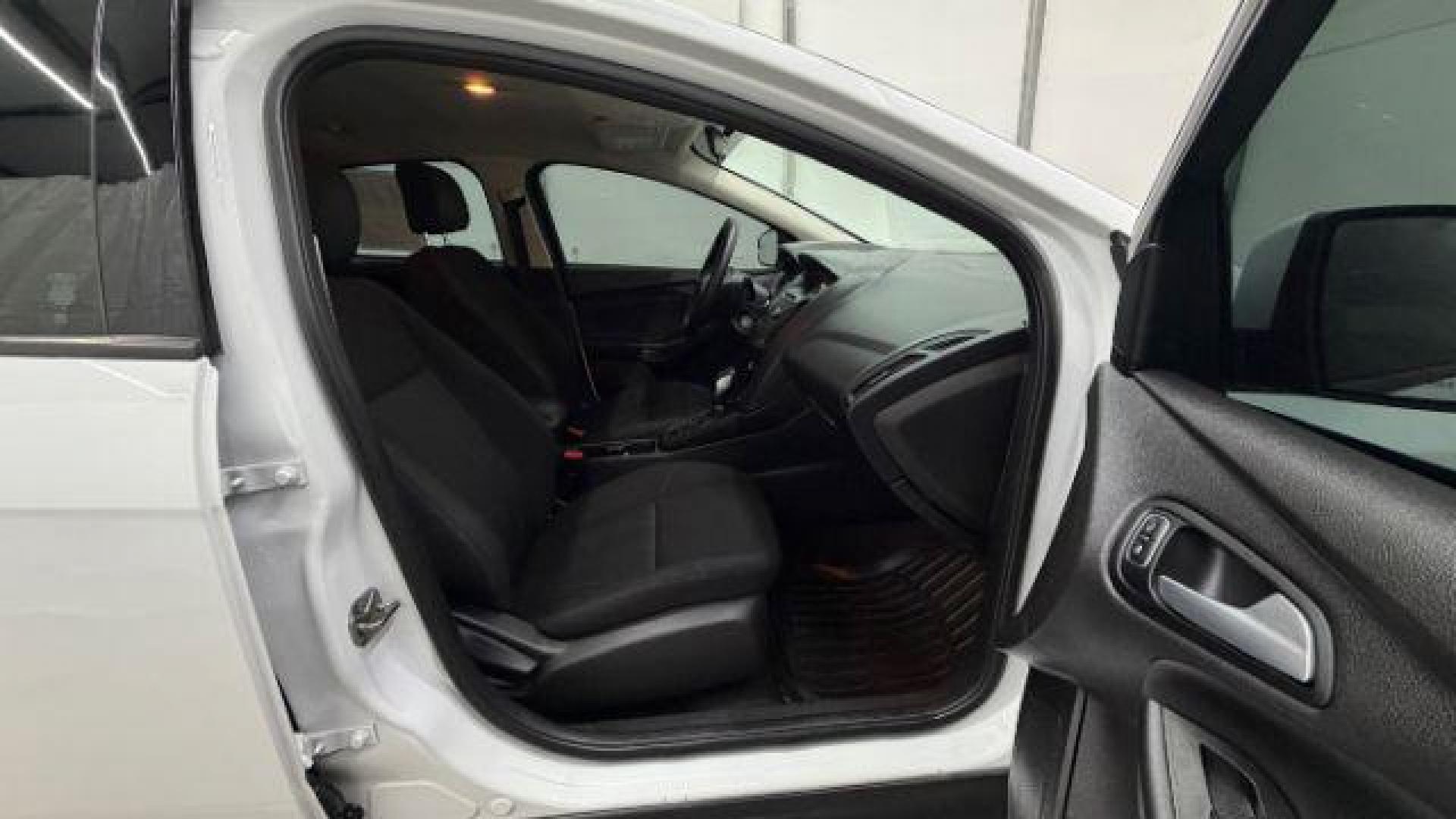 2017 White Ford Focus SE (1FADP3K26HL) with an 2L I-4 gasoline direct injection engine, located at 1806 Veterans Memorial Hwy SW, Austell, GA, 30168, (770) 944-9558, 33.817959, -84.606987 - Photo#17