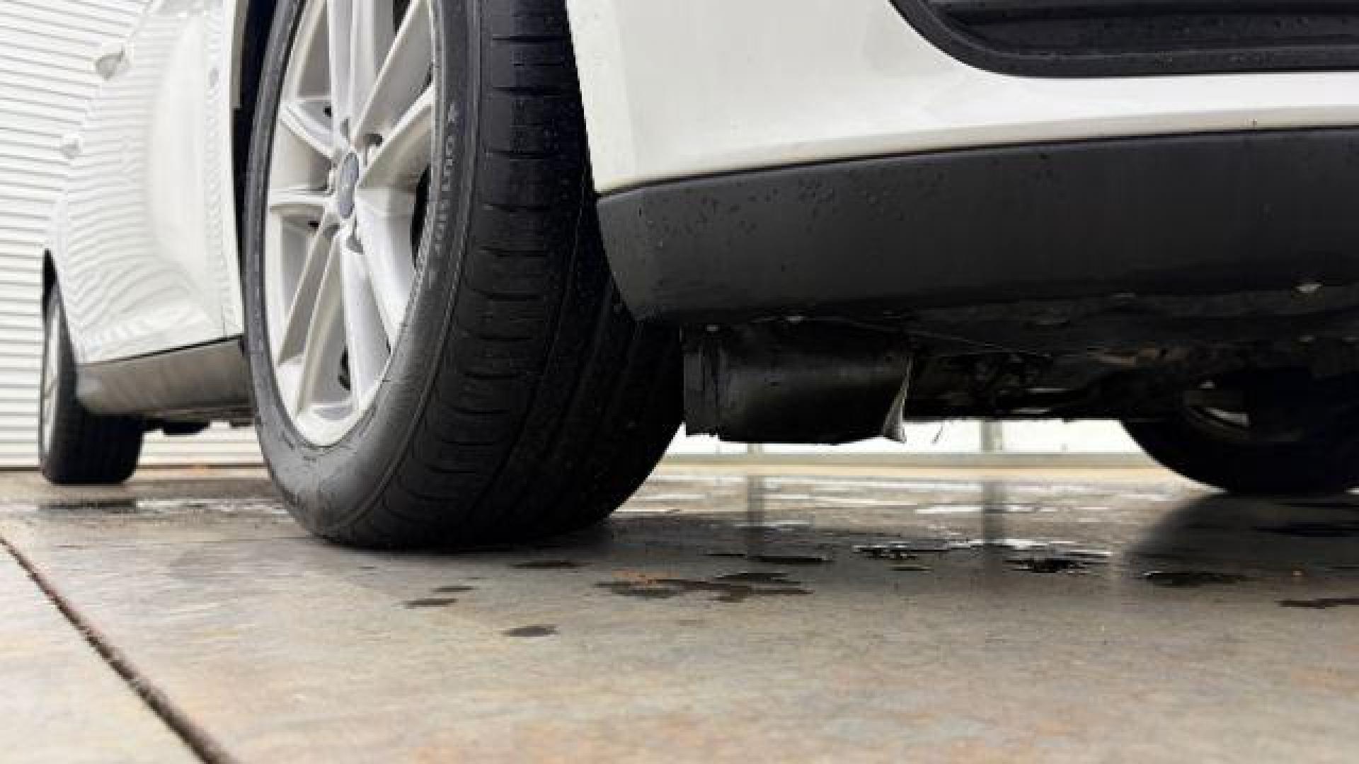 2017 White Ford Focus SE (1FADP3K26HL) with an 2L I-4 gasoline direct injection engine, located at 1806 Veterans Memorial Hwy SW, Austell, GA, 30168, (770) 944-9558, 33.817959, -84.606987 - Photo#18