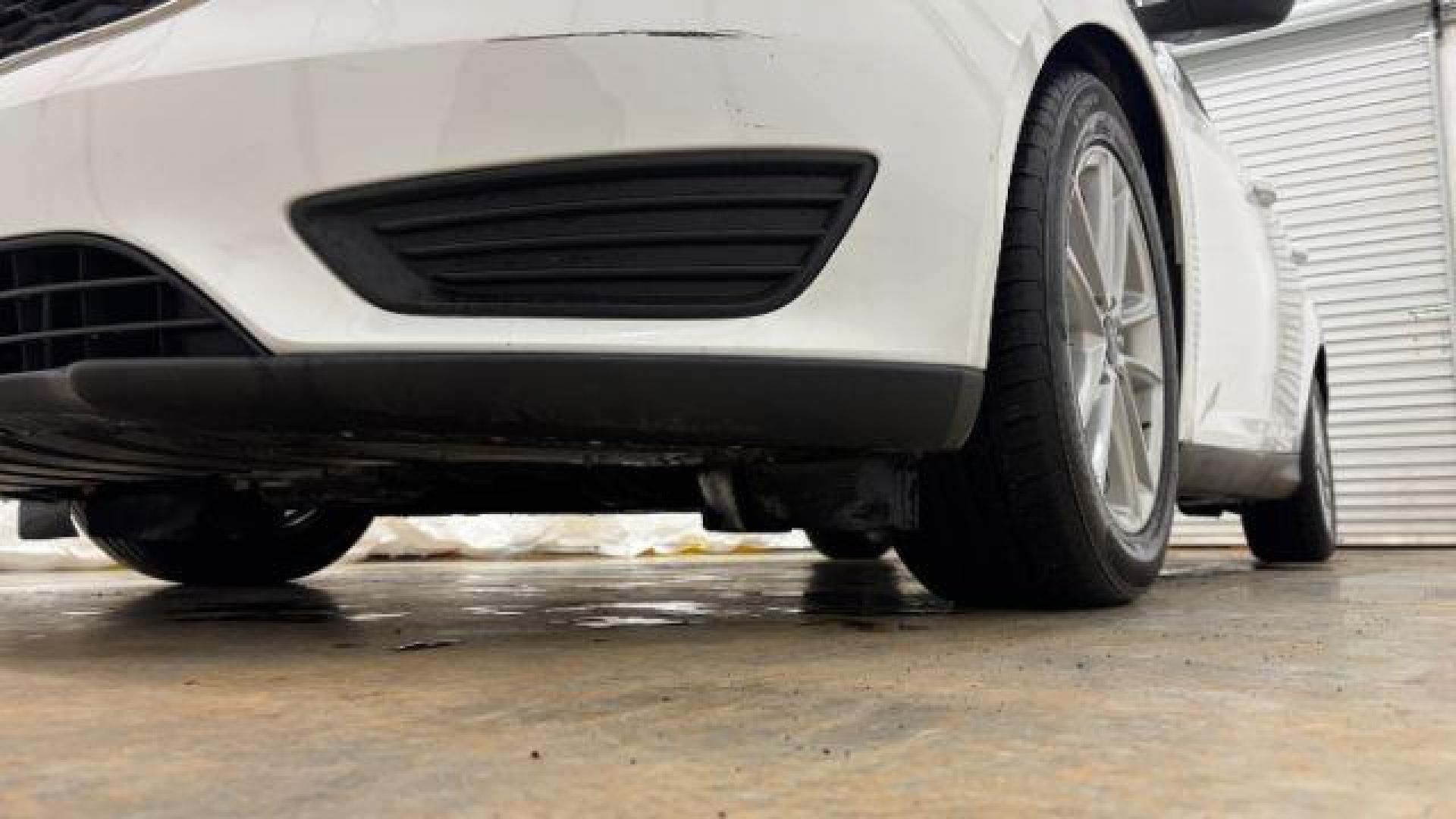 2017 White Ford Focus SE (1FADP3K26HL) with an 2L I-4 gasoline direct injection engine, located at 1806 Veterans Memorial Hwy SW, Austell, GA, 30168, (770) 944-9558, 33.817959, -84.606987 - Photo#19