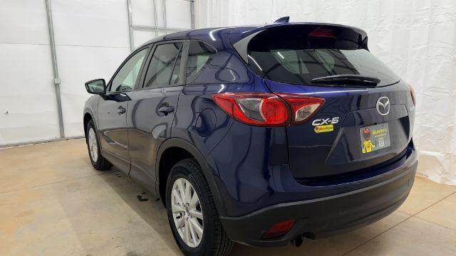 2013 Blue Mazda CX-5 Touring (JM3KE2CE4D0) with an SKYACTIV-G 2L I-4 gasoline direct injection engine, located at 1806 Veterans Memorial Hwy SW, Austell, GA, 30168, (770) 944-9558, 33.817959, -84.606987 - Photo#4
