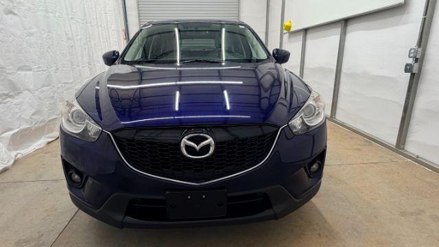 2013 Blue Mazda CX-5 Touring (JM3KE2CE4D0) with an SKYACTIV-G 2L I-4 gasoline direct injection engine, located at 1806 Veterans Memorial Hwy SW, Austell, GA, 30168, (770) 944-9558, 33.817959, -84.606987 - Photo#9