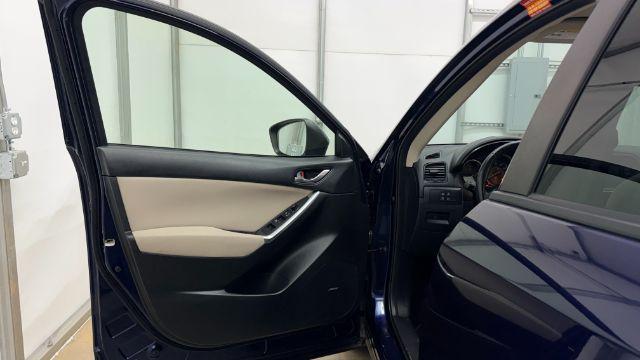 2013 Blue Mazda CX-5 Touring (JM3KE2CE4D0) with an SKYACTIV-G 2L I-4 gasoline direct injection engine, located at 1806 Veterans Memorial Hwy SW, Austell, GA, 30168, (770) 944-9558, 33.817959, -84.606987 - Photo#10