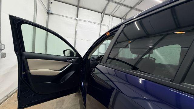 2013 Blue Mazda CX-5 Touring (JM3KE2CE4D0) with an SKYACTIV-G 2L I-4 gasoline direct injection engine, located at 1806 Veterans Memorial Hwy SW, Austell, GA, 30168, (770) 944-9558, 33.817959, -84.606987 - Photo#11