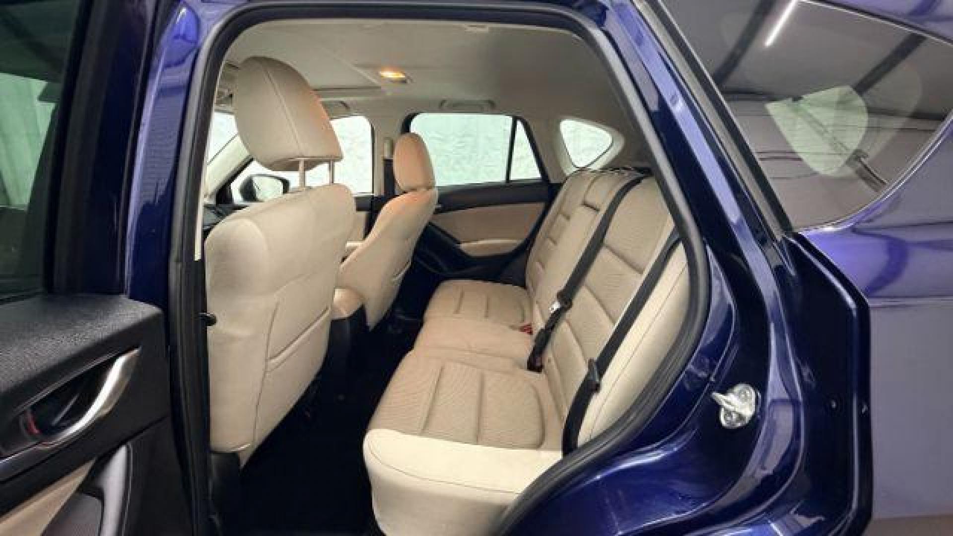 2013 Blue Mazda CX-5 Touring (JM3KE2CE4D0) with an SKYACTIV-G 2L I-4 gasoline direct injection engine, located at 1806 Veterans Memorial Hwy SW, Austell, GA, 30168, (770) 944-9558, 33.817959, -84.606987 - Photo#15