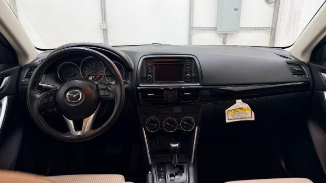 2013 Blue Mazda CX-5 Touring (JM3KE2CE4D0) with an SKYACTIV-G 2L I-4 gasoline direct injection engine, located at 1806 Veterans Memorial Hwy SW, Austell, GA, 30168, (770) 944-9558, 33.817959, -84.606987 - Photo#16
