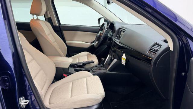 2013 Blue Mazda CX-5 Touring (JM3KE2CE4D0) with an SKYACTIV-G 2L I-4 gasoline direct injection engine, located at 1806 Veterans Memorial Hwy SW, Austell, GA, 30168, (770) 944-9558, 33.817959, -84.606987 - Photo#19