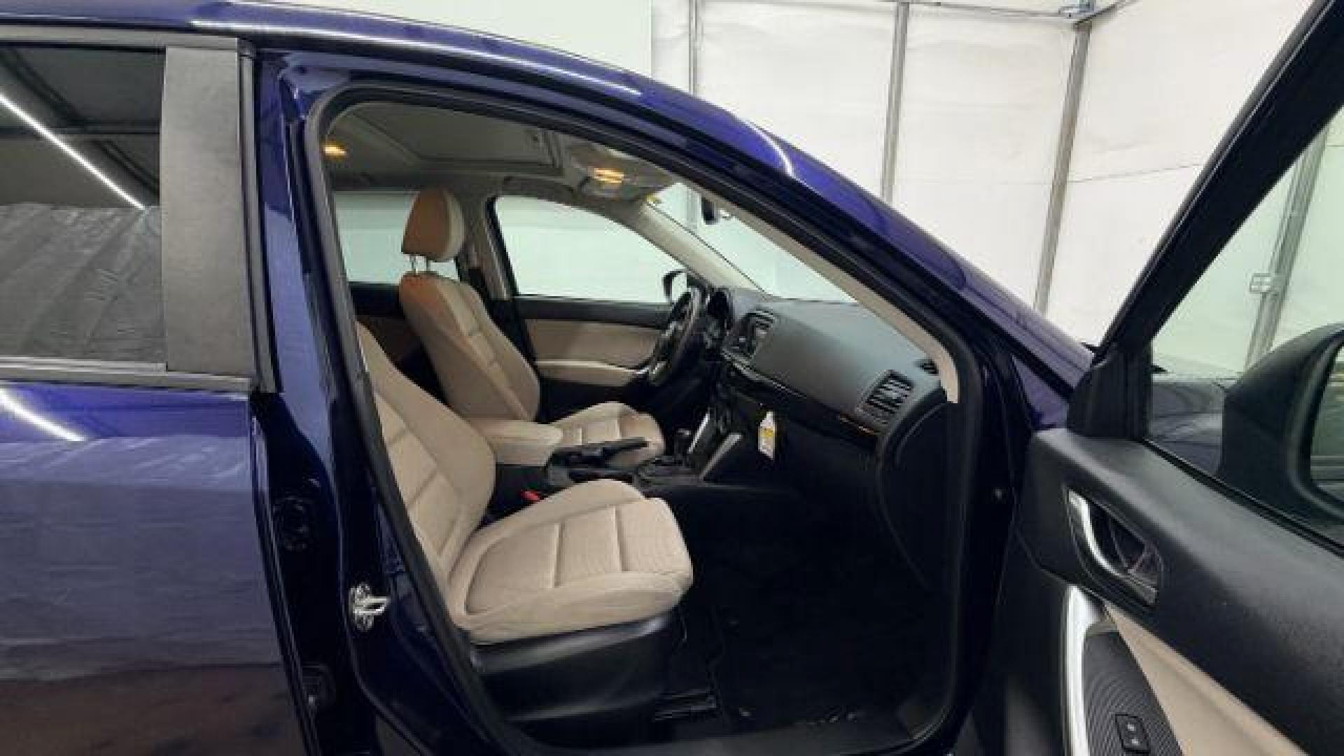 2013 Blue Mazda CX-5 Touring (JM3KE2CE4D0) with an SKYACTIV-G 2L I-4 gasoline direct injection engine, located at 1806 Veterans Memorial Hwy SW, Austell, GA, 30168, (770) 944-9558, 33.817959, -84.606987 - Photo#20