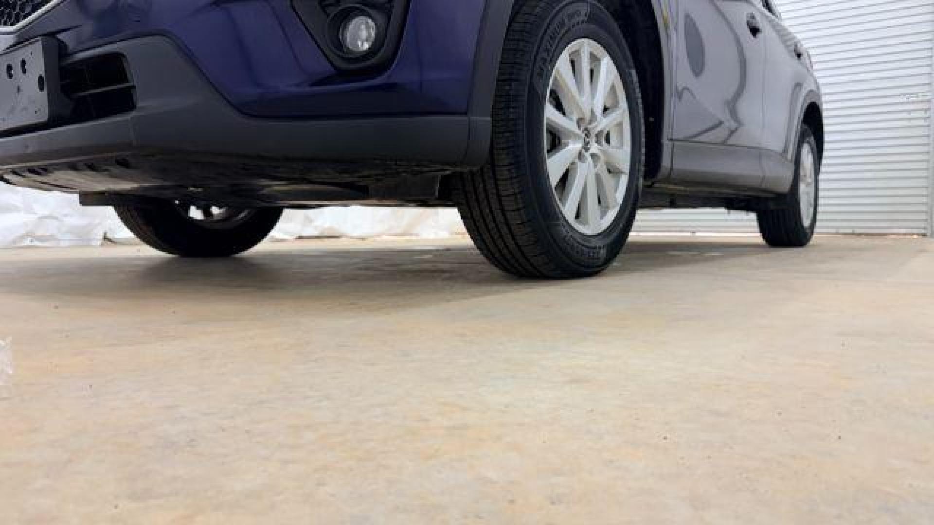 2013 Blue Mazda CX-5 Touring (JM3KE2CE4D0) with an SKYACTIV-G 2L I-4 gasoline direct injection engine, located at 1806 Veterans Memorial Hwy SW, Austell, GA, 30168, (770) 944-9558, 33.817959, -84.606987 - Photo#22