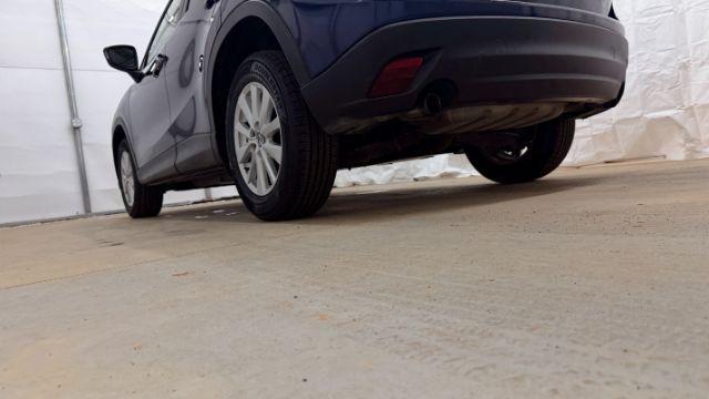 2013 Blue Mazda CX-5 Touring (JM3KE2CE4D0) with an SKYACTIV-G 2L I-4 gasoline direct injection engine, located at 1806 Veterans Memorial Hwy SW, Austell, GA, 30168, (770) 944-9558, 33.817959, -84.606987 - Photo#23