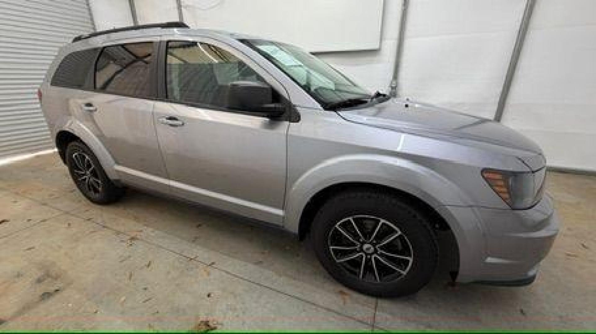 2018 Gray Dodge Journey SE (3C4PDCABXJT) with an Tigershark MultiAir 2.4L I-4 DOHC engine, located at 1806 Veterans Memorial Hwy SW, Austell, GA, 30168, (770) 944-9558, 33.817959, -84.606987 - Photo#7