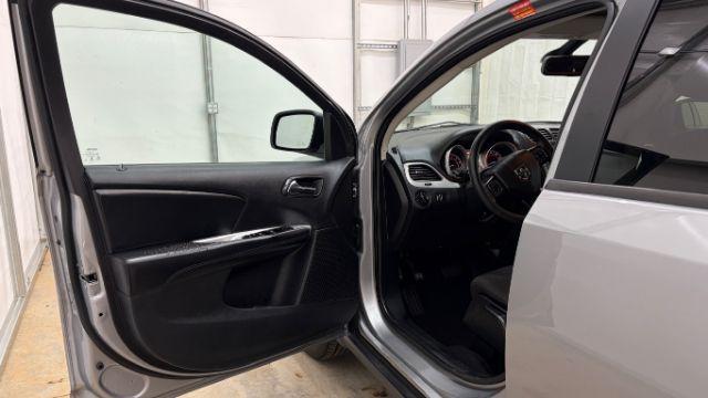 2018 Gray Dodge Journey SE (3C4PDCABXJT) with an Tigershark MultiAir 2.4L I-4 DOHC engine, located at 1806 Veterans Memorial Hwy SW, Austell, GA, 30168, (770) 944-9558, 33.817959, -84.606987 - Photo#10