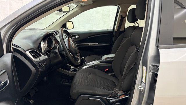 2018 Gray Dodge Journey SE (3C4PDCABXJT) with an Tigershark MultiAir 2.4L I-4 DOHC engine, located at 1806 Veterans Memorial Hwy SW, Austell, GA, 30168, (770) 944-9558, 33.817959, -84.606987 - Photo#11