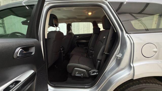 2018 Gray Dodge Journey SE (3C4PDCABXJT) with an Tigershark MultiAir 2.4L I-4 DOHC engine, located at 1806 Veterans Memorial Hwy SW, Austell, GA, 30168, (770) 944-9558, 33.817959, -84.606987 - Photo#14