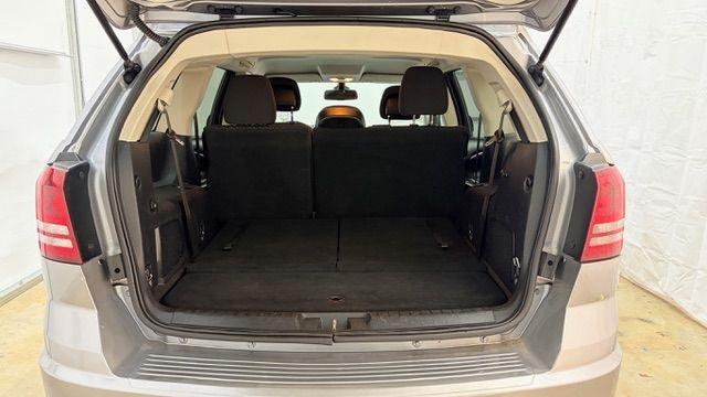 2018 Gray Dodge Journey SE (3C4PDCABXJT) with an Tigershark MultiAir 2.4L I-4 DOHC engine, located at 1806 Veterans Memorial Hwy SW, Austell, GA, 30168, (770) 944-9558, 33.817959, -84.606987 - Photo#16