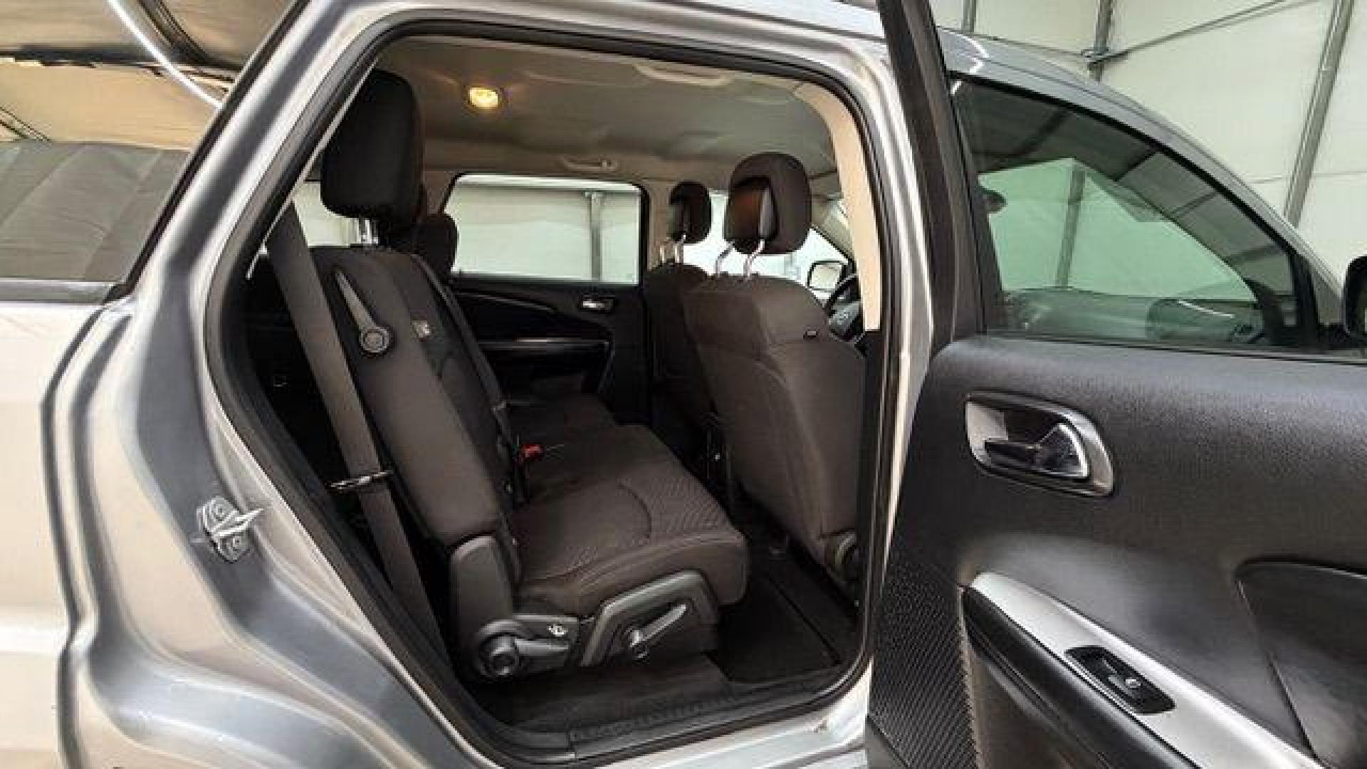 2018 Gray Dodge Journey SE (3C4PDCABXJT) with an Tigershark MultiAir 2.4L I-4 DOHC engine, located at 1806 Veterans Memorial Hwy SW, Austell, GA, 30168, (770) 944-9558, 33.817959, -84.606987 - Photo#17