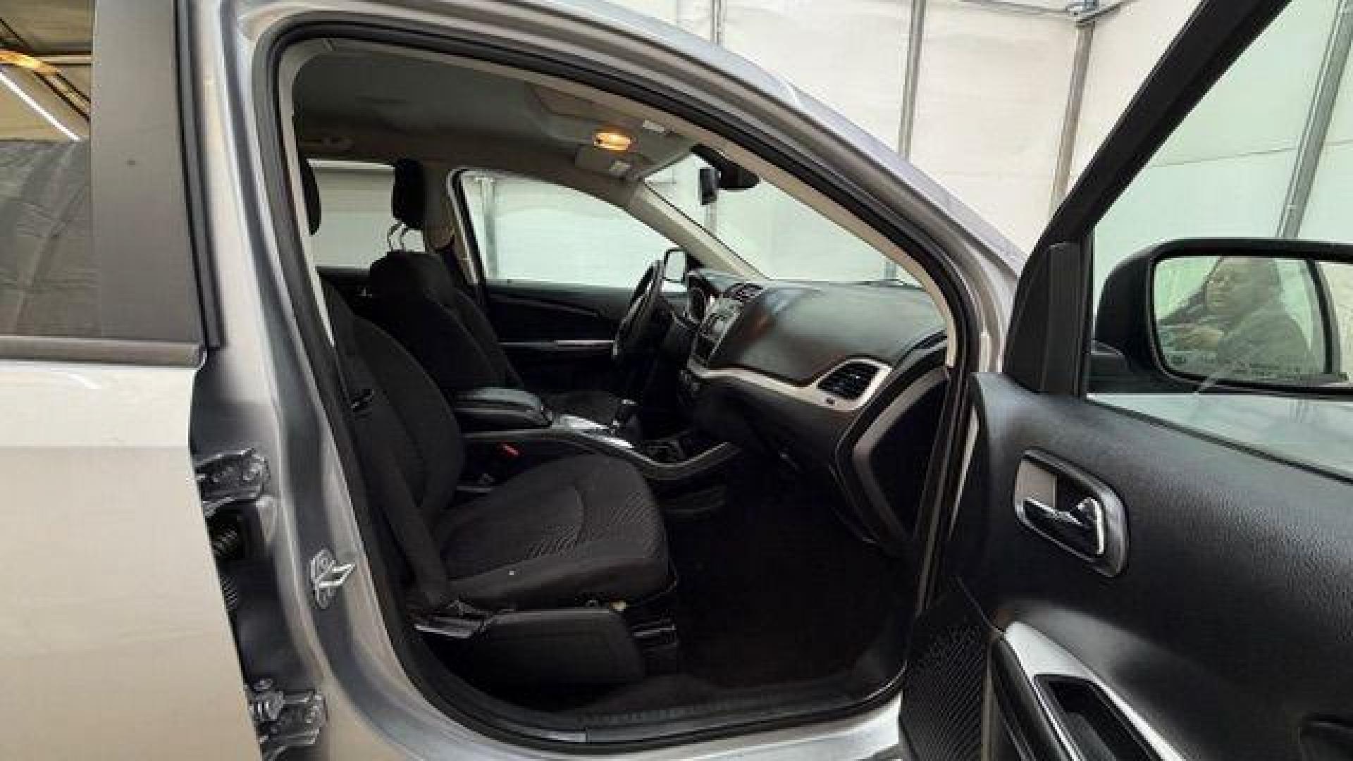 2018 Gray Dodge Journey SE (3C4PDCABXJT) with an Tigershark MultiAir 2.4L I-4 DOHC engine, located at 1806 Veterans Memorial Hwy SW, Austell, GA, 30168, (770) 944-9558, 33.817959, -84.606987 - Photo#18