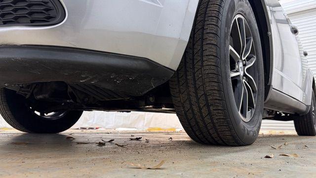 2018 Gray Dodge Journey SE (3C4PDCABXJT) with an Tigershark MultiAir 2.4L I-4 DOHC engine, located at 1806 Veterans Memorial Hwy SW, Austell, GA, 30168, (770) 944-9558, 33.817959, -84.606987 - Photo#20