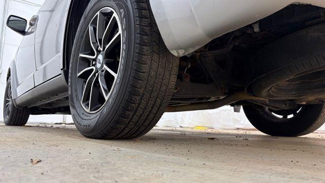 2018 Gray Dodge Journey SE (3C4PDCABXJT) with an Tigershark MultiAir 2.4L I-4 DOHC engine, located at 1806 Veterans Memorial Hwy SW, Austell, GA, 30168, (770) 944-9558, 33.817959, -84.606987 - Photo#21