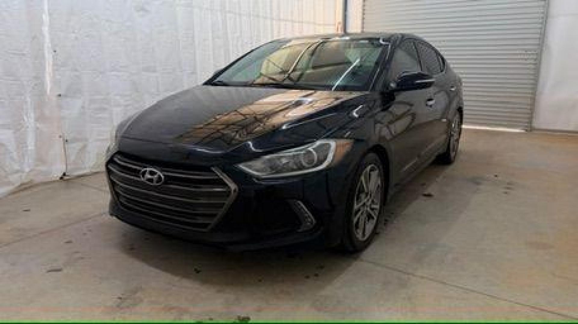 2017 Black Hyundai Elantra Limited (5NPD84LF5HH) with an Nu 2L I-4 DOHC engine, located at 1806 Veterans Memorial Hwy SW, Austell, GA, 30168, (770) 944-9558, 33.817959, -84.606987 - Photo#0