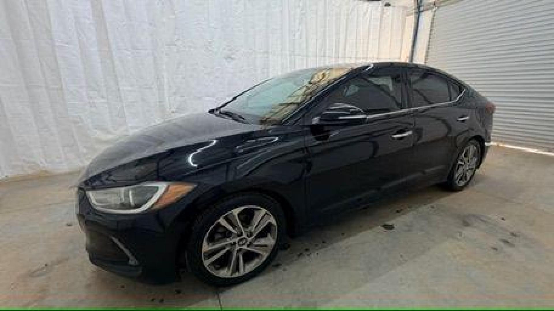 2017 Black Hyundai Elantra Limited (5NPD84LF5HH) with an Nu 2L I-4 DOHC engine, located at 1806 Veterans Memorial Hwy SW, Austell, GA, 30168, (770) 944-9558, 33.817959, -84.606987 - Photo#1