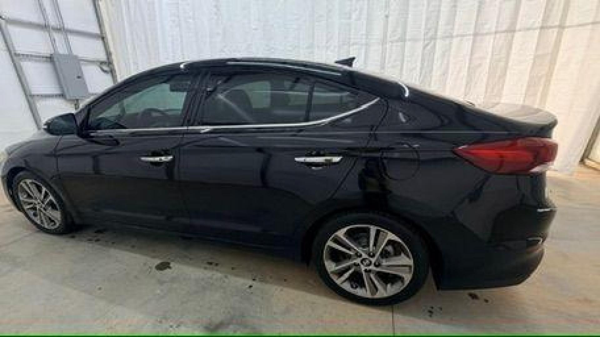 2017 Black Hyundai Elantra Limited (5NPD84LF5HH) with an Nu 2L I-4 DOHC engine, located at 1806 Veterans Memorial Hwy SW, Austell, GA, 30168, (770) 944-9558, 33.817959, -84.606987 - Photo#2