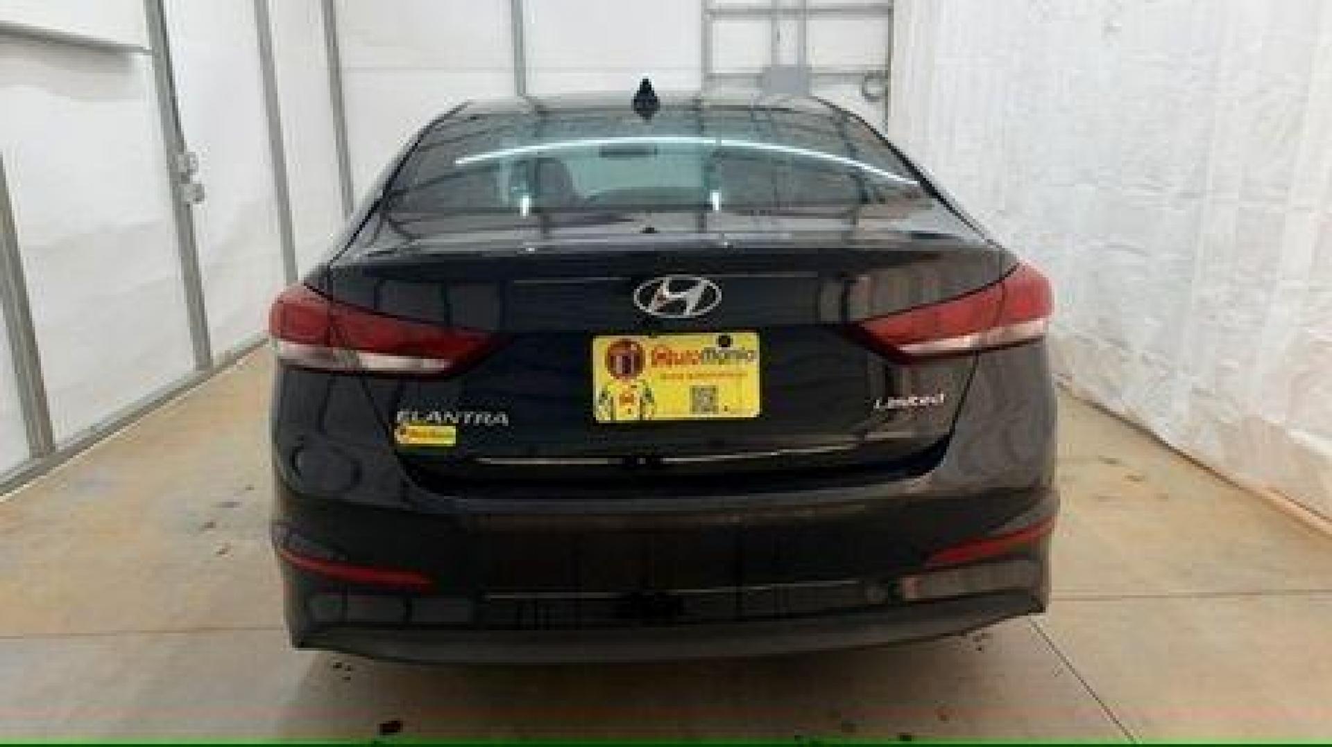 2017 Black Hyundai Elantra Limited (5NPD84LF5HH) with an Nu 2L I-4 DOHC engine, located at 1806 Veterans Memorial Hwy SW, Austell, GA, 30168, (770) 944-9558, 33.817959, -84.606987 - Photo#4