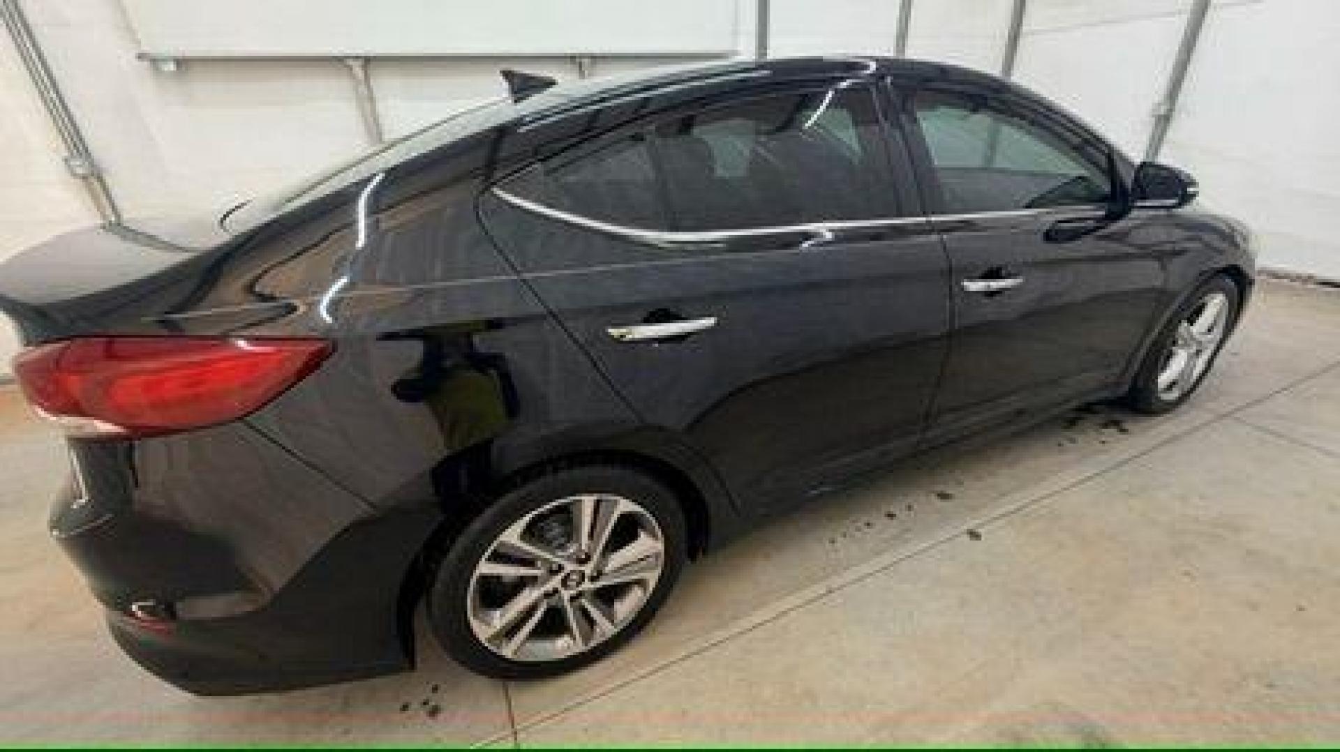 2017 Black Hyundai Elantra Limited (5NPD84LF5HH) with an Nu 2L I-4 DOHC engine, located at 1806 Veterans Memorial Hwy SW, Austell, GA, 30168, (770) 944-9558, 33.817959, -84.606987 - Photo#6