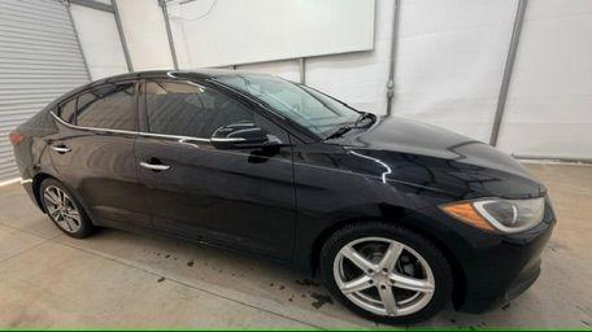 2017 Black Hyundai Elantra Limited (5NPD84LF5HH) with an Nu 2L I-4 DOHC engine, located at 1806 Veterans Memorial Hwy SW, Austell, GA, 30168, (770) 944-9558, 33.817959, -84.606987 - Photo#7