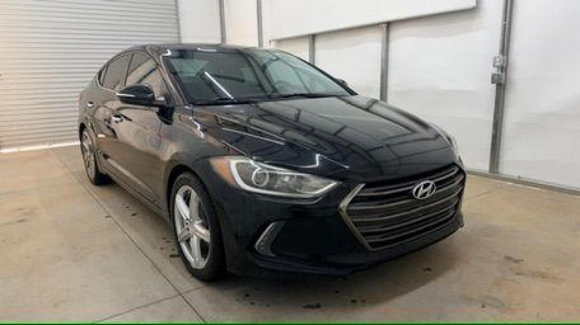 2017 Black Hyundai Elantra Limited (5NPD84LF5HH) with an Nu 2L I-4 DOHC engine, located at 1806 Veterans Memorial Hwy SW, Austell, GA, 30168, (770) 944-9558, 33.817959, -84.606987 - Photo#8