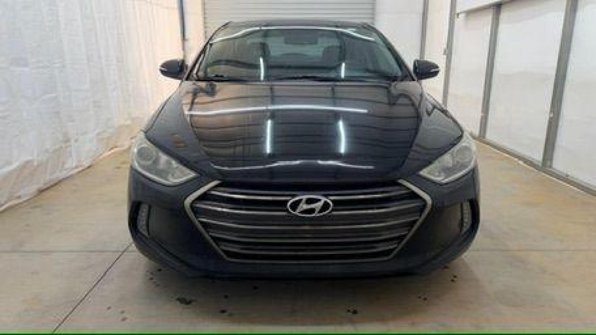 2017 Black Hyundai Elantra Limited (5NPD84LF5HH) with an Nu 2L I-4 DOHC engine, located at 1806 Veterans Memorial Hwy SW, Austell, GA, 30168, (770) 944-9558, 33.817959, -84.606987 - Photo#9