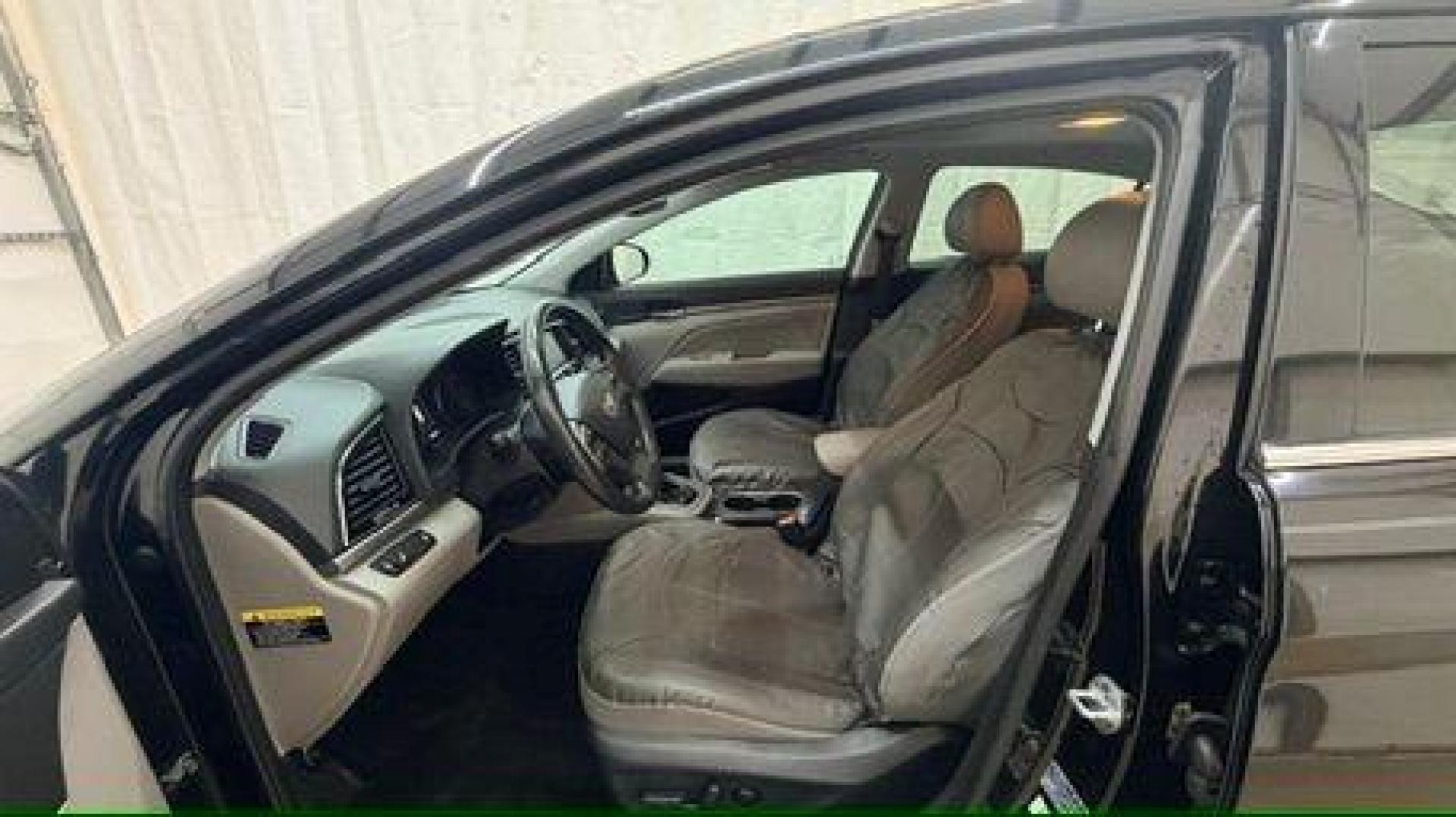 2017 Black Hyundai Elantra Limited (5NPD84LF5HH) with an Nu 2L I-4 DOHC engine, located at 1806 Veterans Memorial Hwy SW, Austell, GA, 30168, (770) 944-9558, 33.817959, -84.606987 - Photo#11