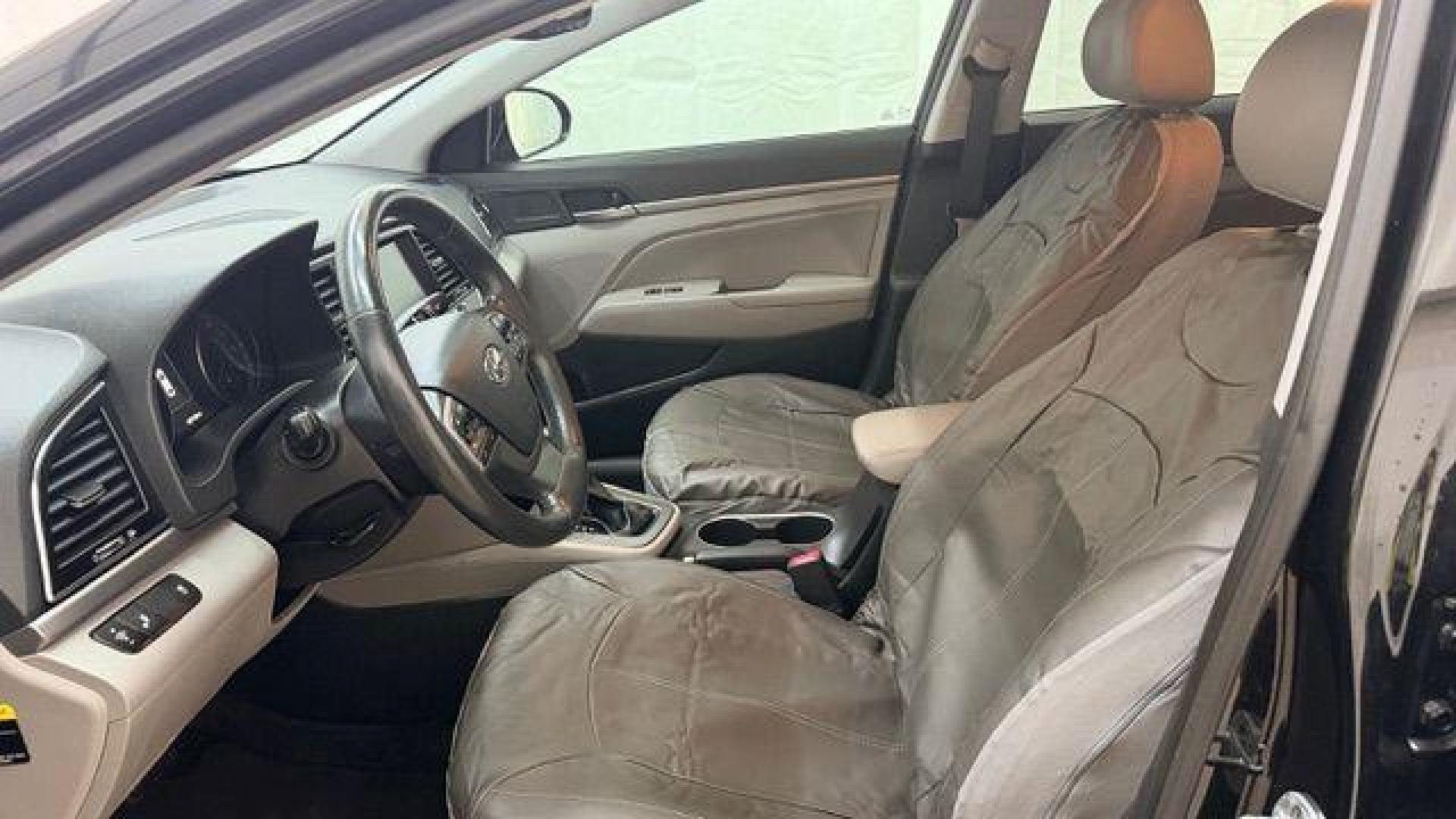 2017 Black Hyundai Elantra Limited (5NPD84LF5HH) with an Nu 2L I-4 DOHC engine, located at 1806 Veterans Memorial Hwy SW, Austell, GA, 30168, (770) 944-9558, 33.817959, -84.606987 - Photo#12