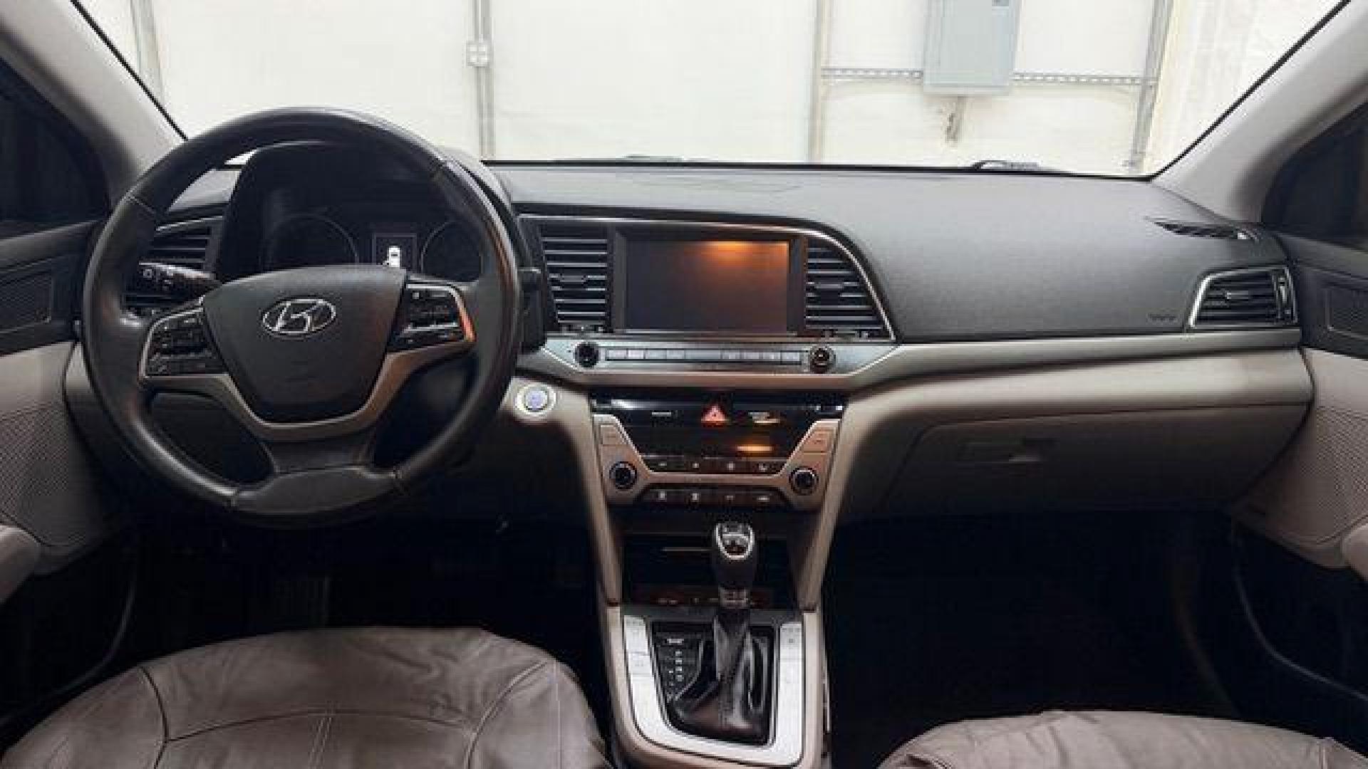 2017 Black Hyundai Elantra Limited (5NPD84LF5HH) with an Nu 2L I-4 DOHC engine, located at 1806 Veterans Memorial Hwy SW, Austell, GA, 30168, (770) 944-9558, 33.817959, -84.606987 - Photo#15