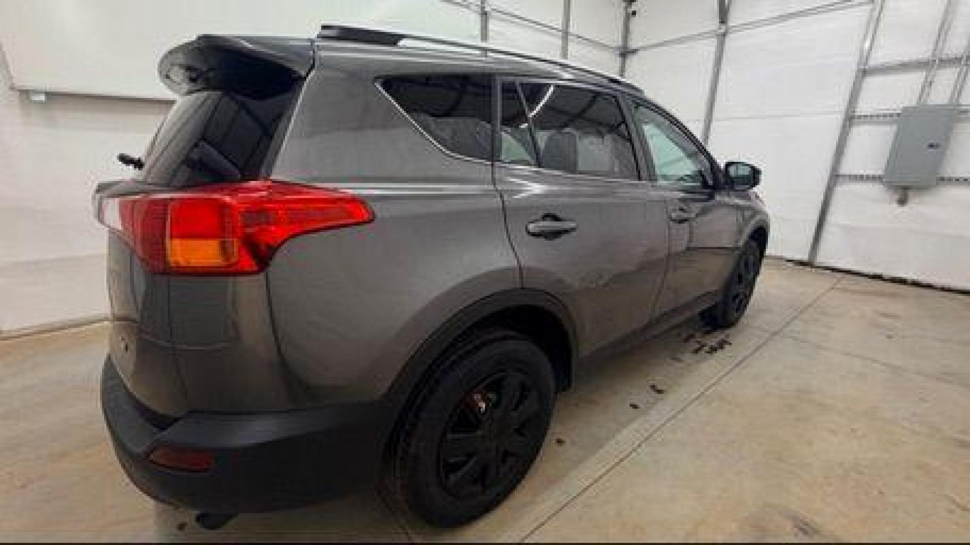 2014 gray Toyota RAV4 LE (2T3ZFREV2EW) with an 2.5L I-4 DOHC engine, located at 1806 Veterans Memorial Hwy SW, Austell, GA, 30168, (770) 944-9558, 33.817959, -84.606987 - Photo#6