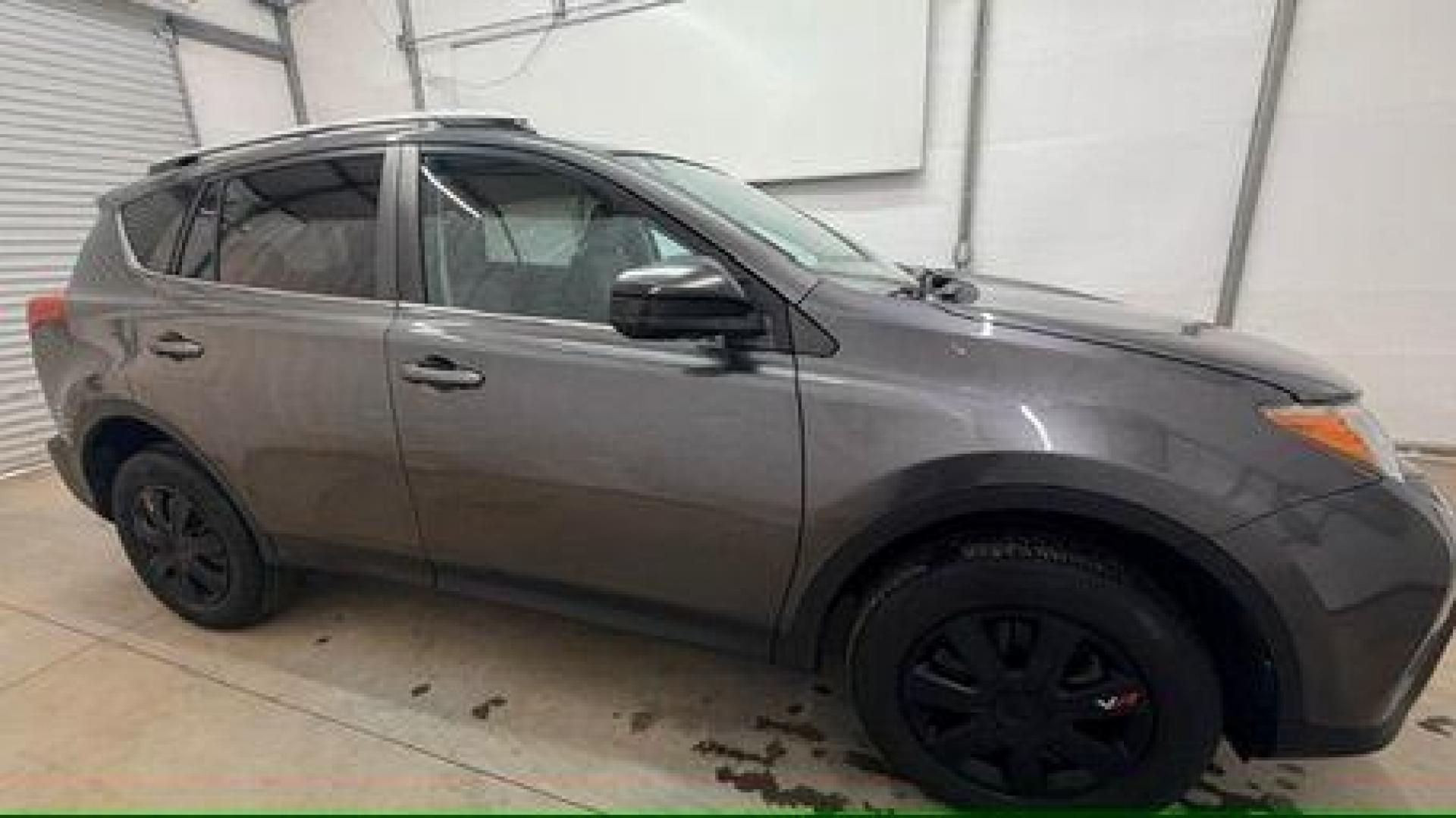 2014 gray Toyota RAV4 LE (2T3ZFREV2EW) with an 2.5L I-4 DOHC engine, located at 1806 Veterans Memorial Hwy SW, Austell, GA, 30168, (770) 944-9558, 33.817959, -84.606987 - Photo#7