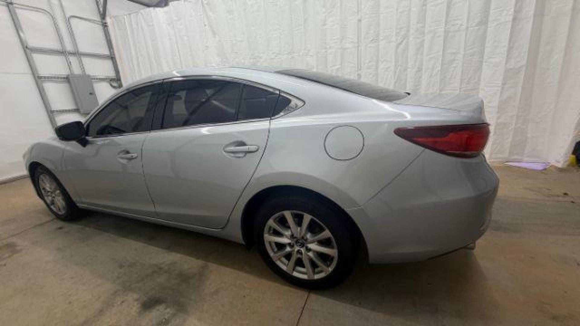 2017 Silver Mazda Mazda6 Sport (JM1GL1U59H1) with an SKYACTIV-G 2.5L I-4 gasoline direct injection engine, located at 1806 Veterans Memorial Hwy SW, Austell, GA, 30168, (770) 944-9558, 33.817959, -84.606987 - Photo#2