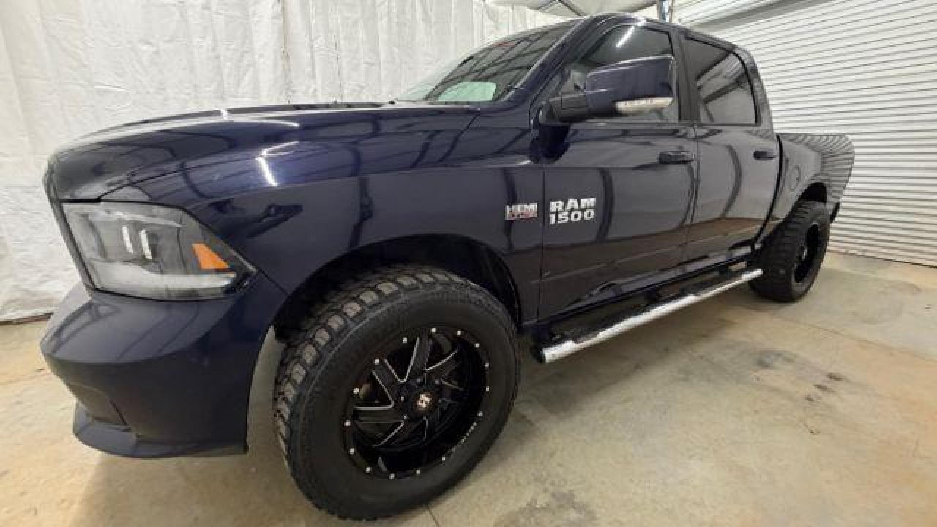 2013 Blue Ram 1500 Sport (1C6RR7MT4DS) with an HEMI 5.7L V-8 variable valve control engine, located at 1806 Veterans Memorial Hwy SW, Austell, GA, 30168, (770) 944-9558, 33.817959, -84.606987 - Photo#1