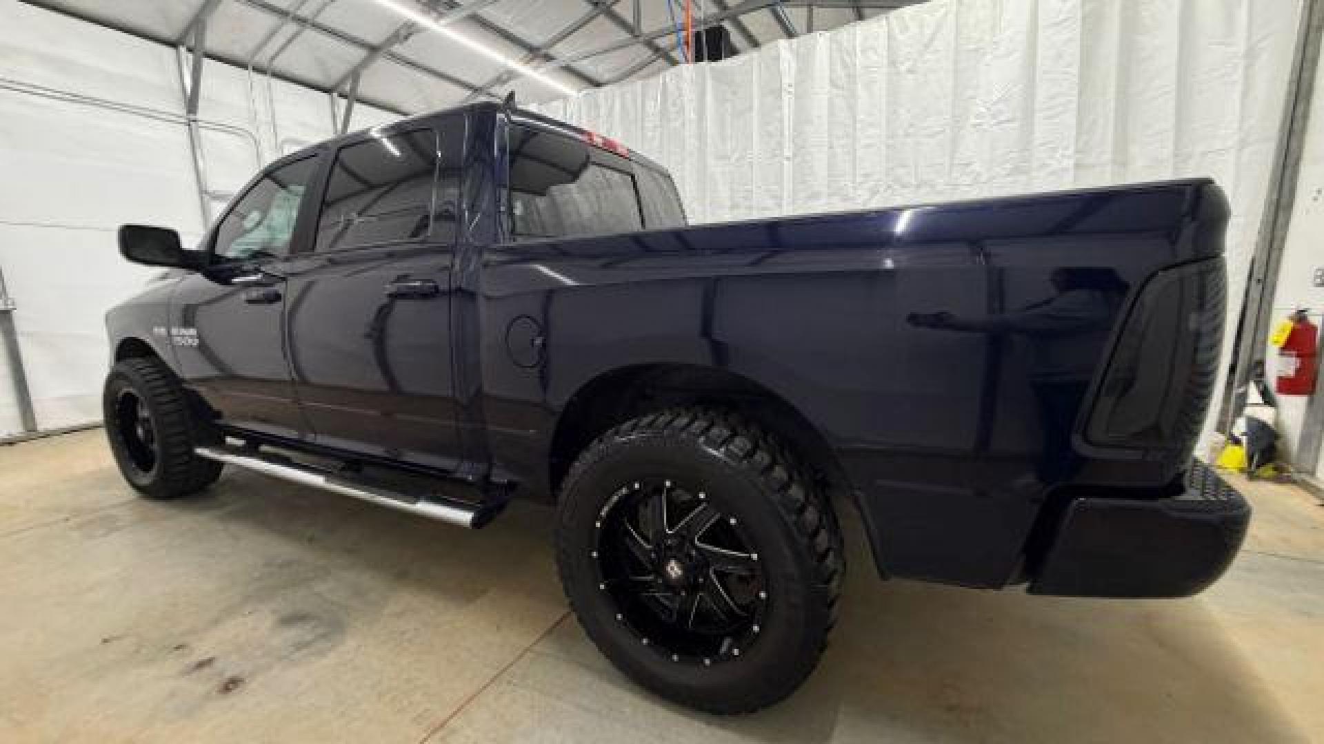 2013 Blue Ram 1500 Sport (1C6RR7MT4DS) with an HEMI 5.7L V-8 variable valve control engine, located at 1806 Veterans Memorial Hwy SW, Austell, GA, 30168, (770) 944-9558, 33.817959, -84.606987 - Photo#2