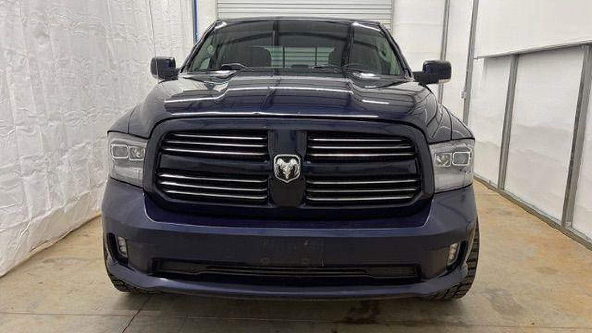 2013 Blue Ram 1500 Sport (1C6RR7MT4DS) with an HEMI 5.7L V-8 variable valve control engine, located at 1806 Veterans Memorial Hwy SW, Austell, GA, 30168, (770) 944-9558, 33.817959, -84.606987 - Photo#8