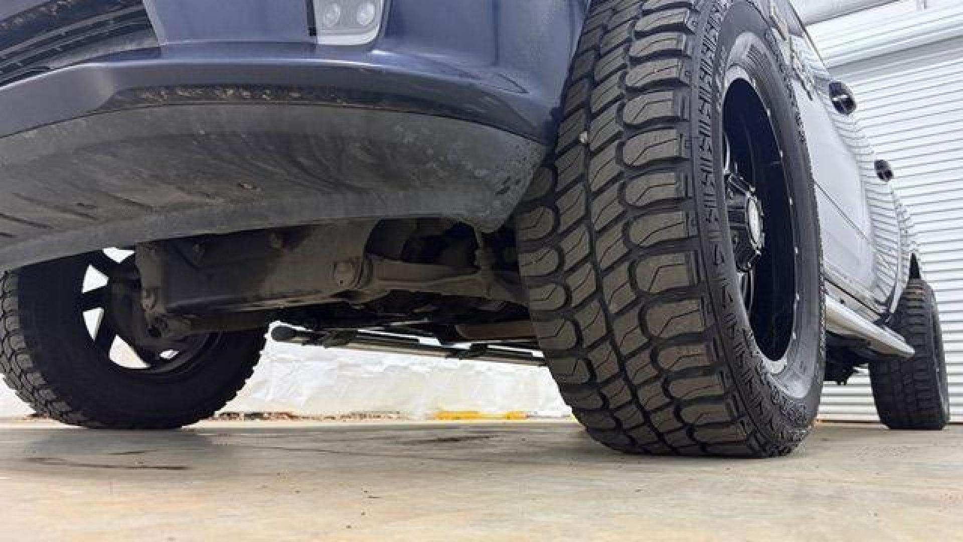 2013 Blue Ram 1500 Sport (1C6RR7MT4DS) with an HEMI 5.7L V-8 variable valve control engine, located at 1806 Veterans Memorial Hwy SW, Austell, GA, 30168, (770) 944-9558, 33.817959, -84.606987 - Photo#18