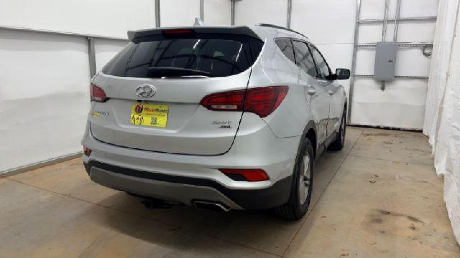 2018 Silver Hyundai Santa Fe Sport 2.4L (5XYZUDLB5JG) with an Theta II 2.4L I-4 gasoline direct injection engine, located at 1806 Veterans Memorial Hwy SW, Austell, GA, 30168, (770) 944-9558, 33.817959, -84.606987 - Photo#5